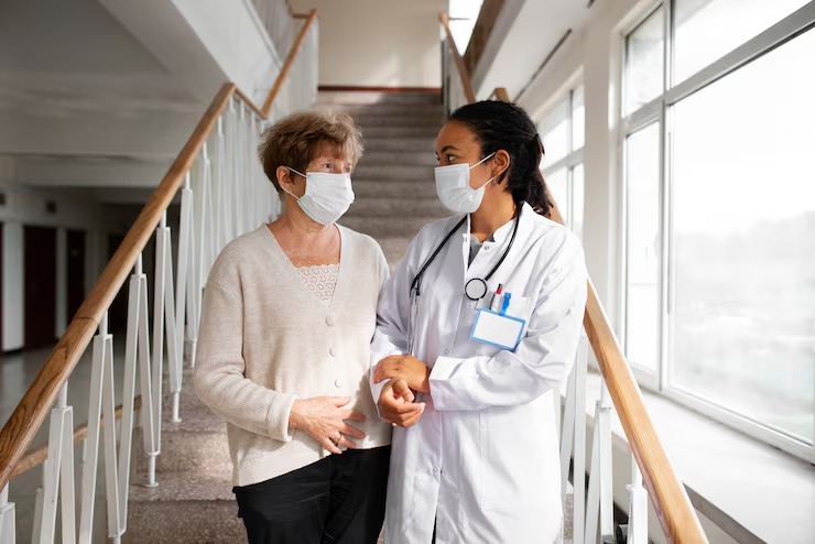 Trusted Professionals at Local Urgent Care Centers imgi 48 patient doctor walking together medium shot 23 2149856218