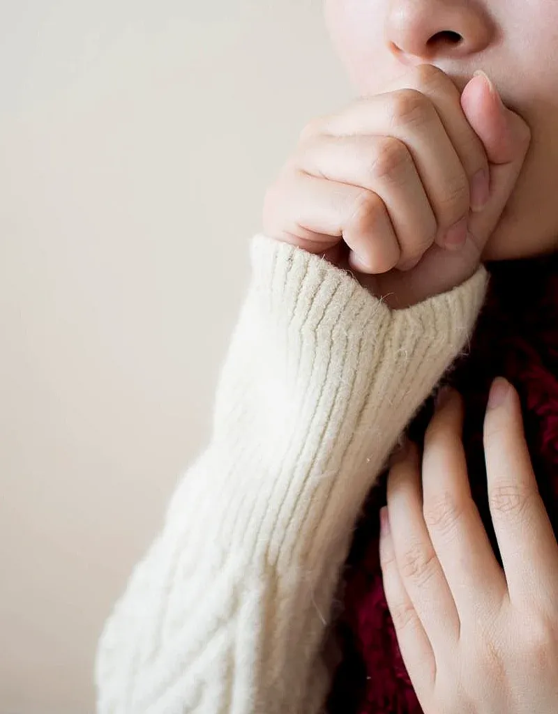 female with cough